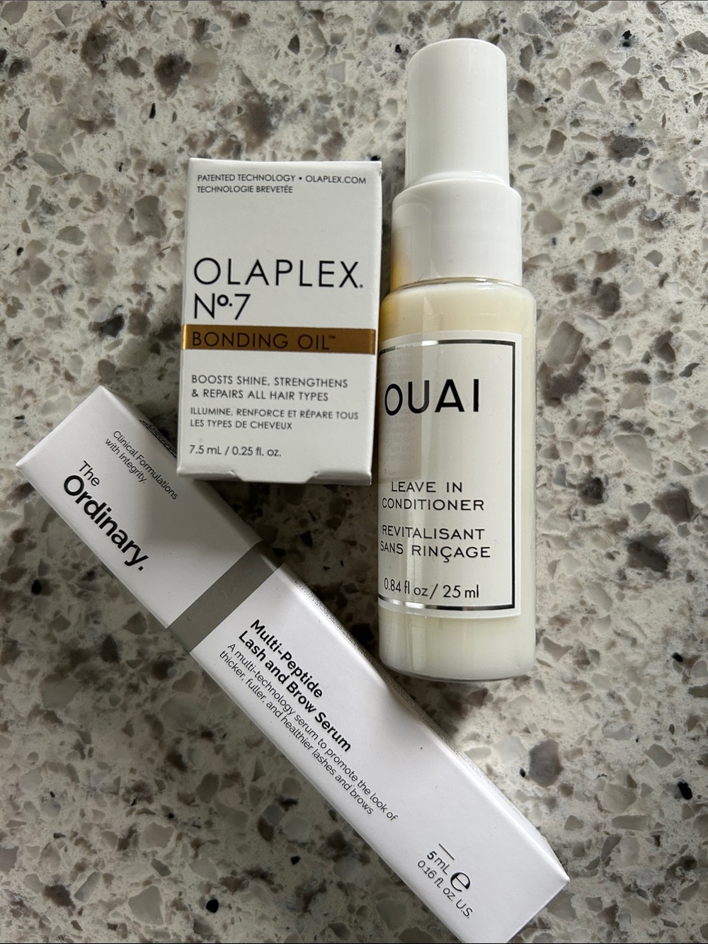 The Ordinary Serum brow lashes + OLAPLEX mini bonding oil + Ouai conditioner